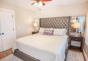 a bedroom with a large bed with a large headboard at Starlight Ridge in Seven Devils