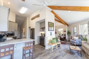 a kitchen and living room with a counter top at Top Of The Hill in Seven Devils