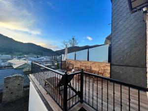 a balcony with a view of the water at Tu&Mi Villafranca in Villafranca del Bierzo