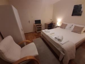En eller flere senger på et rom på Haus Apartman Zaječar M&L