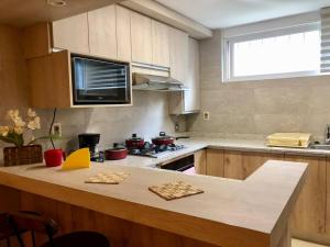 Kuhinja oz. manjša kuhinja v nastanitvi Apartamento acogedor en Achumani