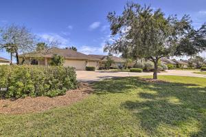 a house with a tree in a yard at Vacation Home Rental Near South Padre Island in Laguna Vista
