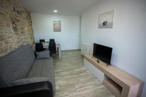 Telewizja i/lub zestaw kina domowego w obiekcie La casita del abuelo
