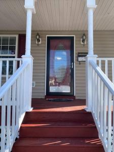 a front door with a window on a house at The Best Vacation Home To Fit All Your Needs! in Hyattsville