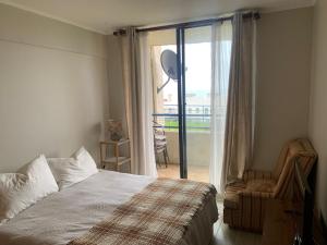 Postel nebo postele na pokoji v ubytování Departamento con vista al mar concon