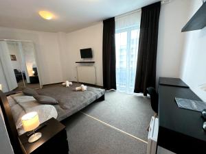 TV a/nebo společenská místnost v ubytování Hotel Modena