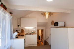 Dapur atau dapur kecil di Le cocoon - appartement dans maison du XVIIème siècle +25 gambar