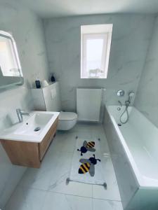 Koupelna v ubytování Apartmán U včelína