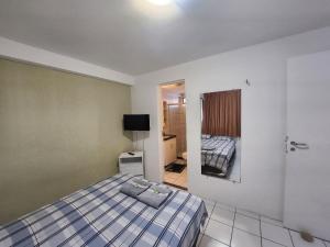 Postel nebo postele na pokoji v ubytování Condomínio Costa do Sol + 112 fotografií