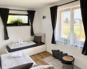 Postel nebo postele na pokoji v ubytování Apartmány DOME