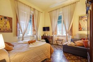 Postel nebo postele na pokoji v ubytování Villa San Donato B&B