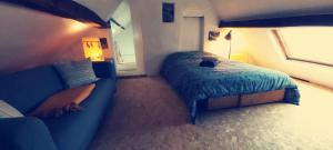 Postel nebo postele na pokoji v ubytování O'pOzArt Guesthouse