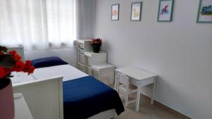 Łóżko lub łóżka w pokoju w obiekcie Ático de ensueño, El Toyo, Almería - Playas, Golf, Cabo de Gata