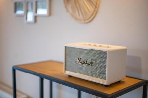 a small radio sitting on top of a table at MyKosVilla with private pool in Kos Town