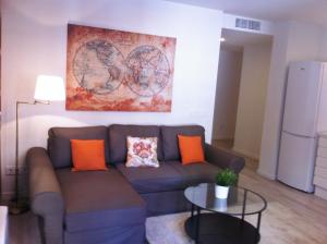A seating area at Superb Central Market Apt