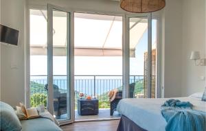 Ένα ή περισσότερα κρεβάτια σε δωμάτιο στο Beautiful Apartment In Moneglia