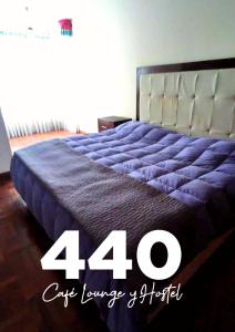 a bed in a room with a large mattress at 440 Café Lounge y Hostel in La Paz