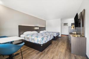 Postel nebo postele na pokoji v ubytování Motel 6-Bend, OR