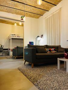Area soggiorno di Sweet Life House Rome Cavour