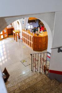 a view of a kitchen from the inside of a house at Hotel Posada el Cid in Oaxaca City