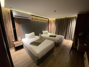 Katil atau katil-katil dalam bilik di The View Delta Hotel