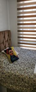 Una cama o camas en una habitación de Apartamento Moderno Nuevo