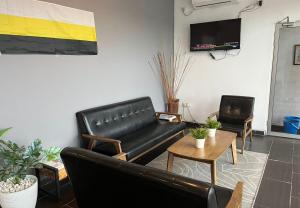 TV a/nebo společenská místnost v ubytování 1108 Hotel Sungkai