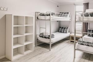 Postel nebo postele na pokoji v ubytování Yamba Central