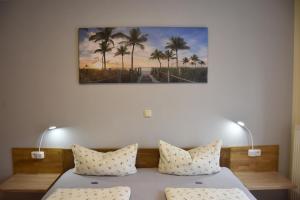 Postel nebo postele na pokoji v ubytování Hotel Garni Am Klostermarkt