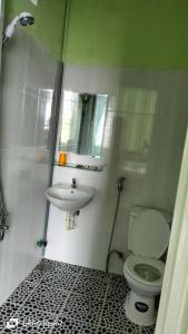 Koupelna v ubytování Nhà Nghỉ Lâm Tùng
