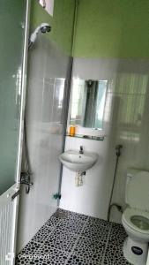 Koupelna v ubytování Nhà Nghỉ Lâm Tùng