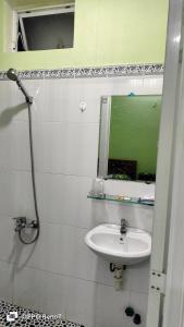 Koupelna v ubytování Nhà Nghỉ Lâm Tùng