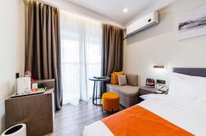 Shenzhen Kingkey Kingyu Hotelにあるベッド