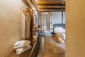 Cama o camas de una habitación en Oniros Residenza Vecchia