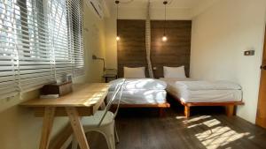 Postel nebo postele na pokoji v ubytování Cozy House Hostel