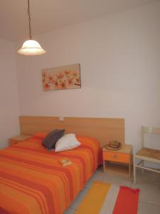 A bed or beds in a room at Villa with garden close to Bibione beach - Beahost