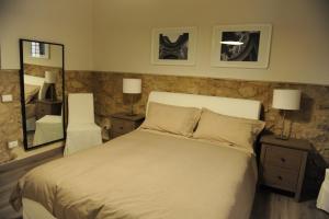 Posteľ alebo postele v izbe v ubytovaní B&B Al Teatro