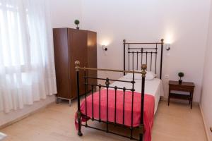 A bed or beds in a room at Canal D'Amour by Katia