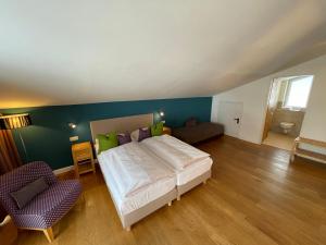 Łóżko lub łóżka w pokoju w obiekcie Villa Augustine In Hinterglemm Zentrum