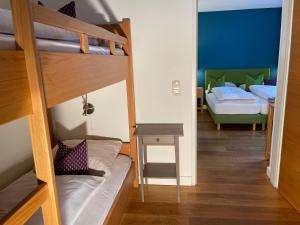 Łóżko lub łóżka w pokoju w obiekcie Villa Augustine In Hinterglemm Zentrum