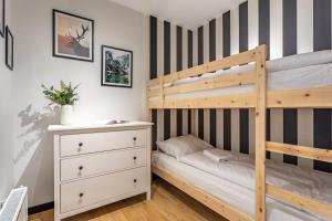 Posteľ alebo postele v izbe v ubytovaní Green Park Resort D5- z dostępem do basenu, sauny, jacuzzi, siłowni