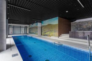 Bazén v ubytovaní Green Park Resort D5- z dostępem do basenu, sauny, jacuzzi, siłowni alebo v jeho blízkosti