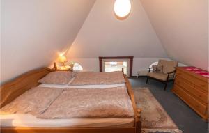 Ένα ή περισσότερα κρεβάτια σε δωμάτιο στο 2 Bedroom Cozy Apartment In Dagebüll