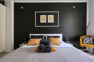 Posteľ alebo postele v izbe v ubytovaní Cardo Apartments