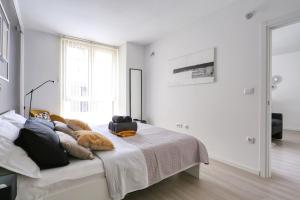 Posteľ alebo postele v izbe v ubytovaní Cardo Apartments
