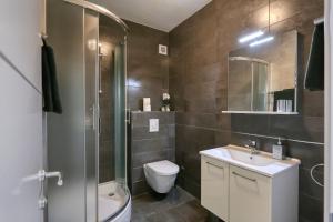Kúpeľňa v ubytovaní Cardo Apartments