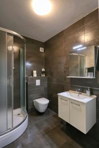 Kúpeľňa v ubytovaní Cardo Apartments