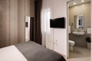 Salle de bains dans l'établissement Urban Isle