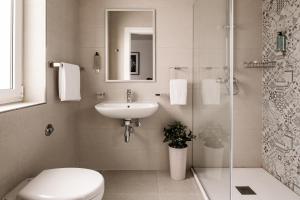 Salle de bains dans l'établissement Urban Isle