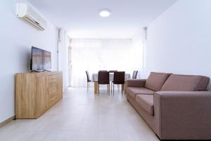 TV a/nebo společenská místnost v ubytování Beach Papa Luna Apartment